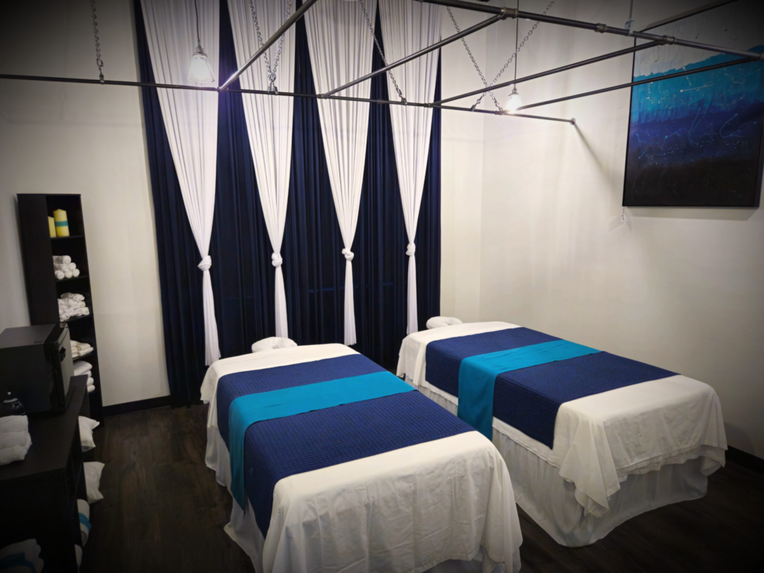 Couples massage suite at Luxe Thai Massage near Stone Oak, offering a private and relaxing space for two guests to enjoy side-by-side massage therapy.